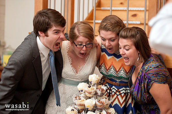 Bride and Groom with Cupcake Tower and Wedding Guests