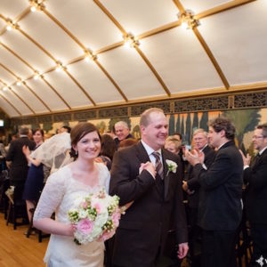 Bride and Groom Walk Down the Aisle After Wedding Ceremony