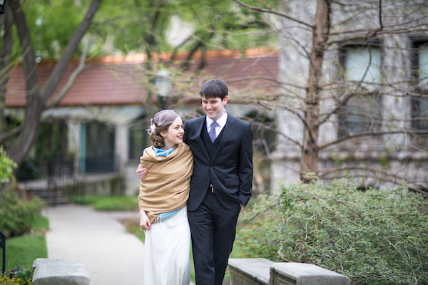 Bride and Groom Walk Outside After Wedding Ceremony