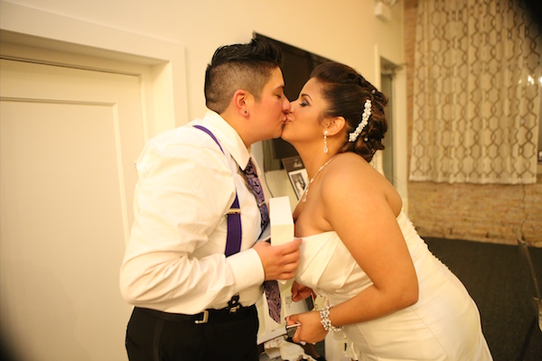 LGBTQ+ Couple Kiss at Wedding