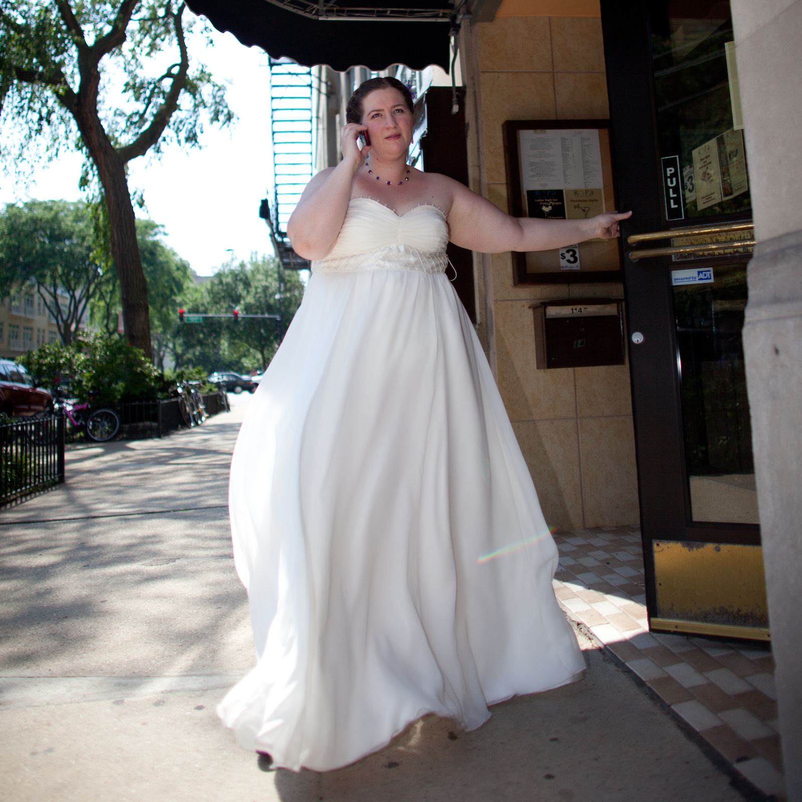 It's me, on my wedding day, making calls. Don't be like me. Let me be me and do this for you. Photo © Starbelly Studios