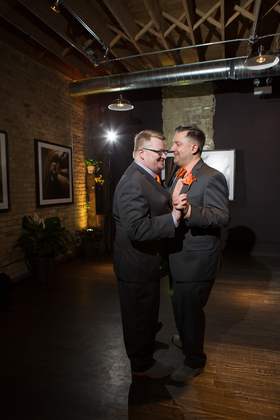 Two Grooms share their first dance at their Chicago wedding. © Cristina G Photography
