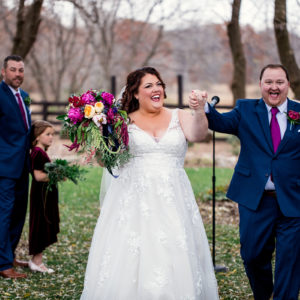 bride and groom at end of outdoor wedding ceremony