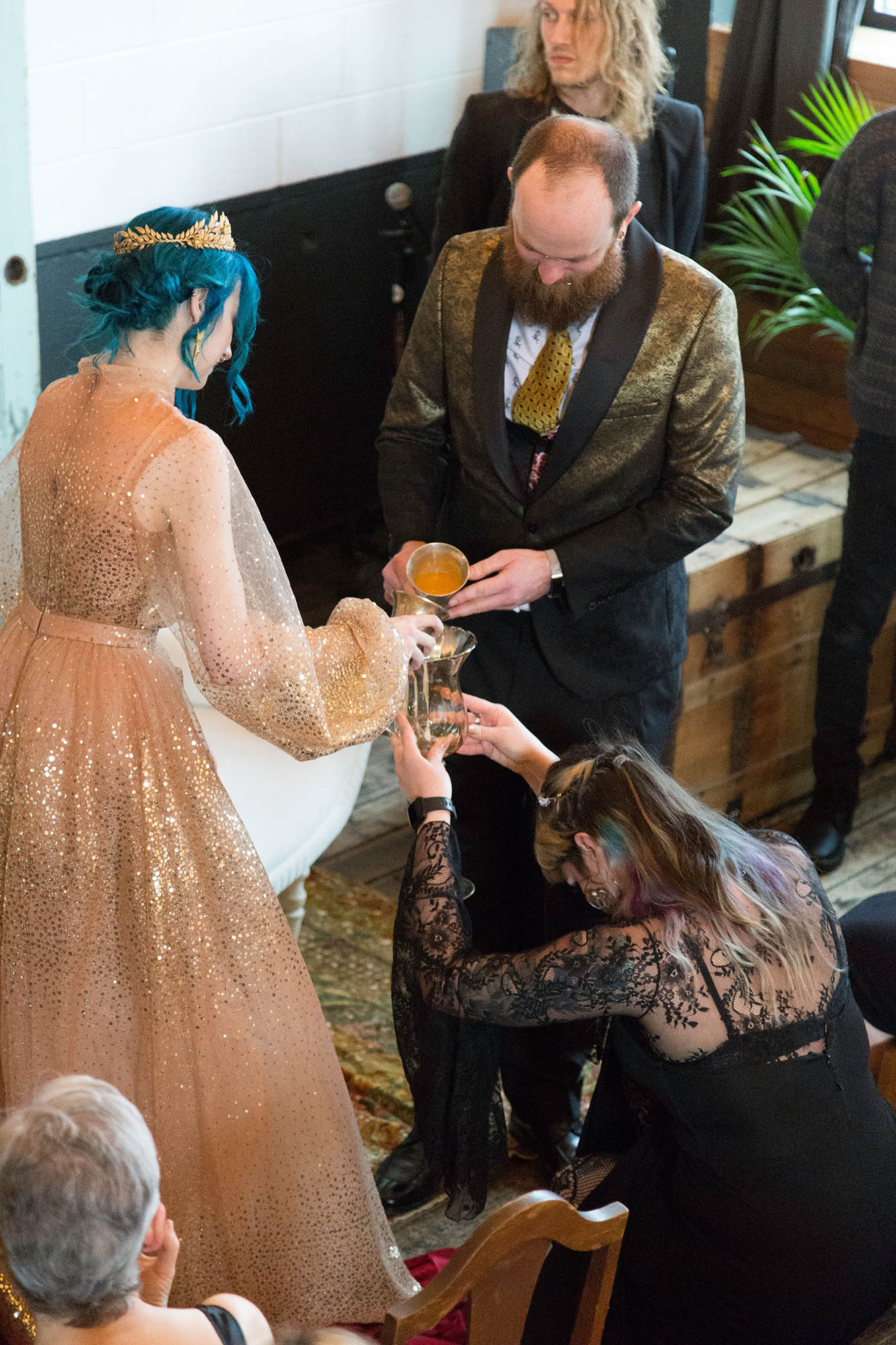 Bride and Groom Pour Edible Glitter into Chalice at Goth Wedding Ceremony