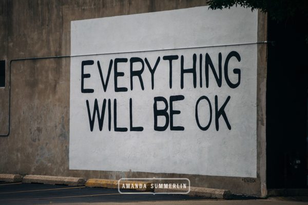 mural reads Everything Will Be Ok in black text on white background