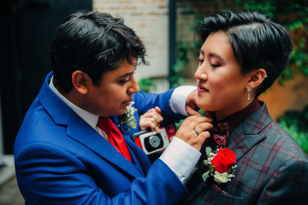 marrier fixes spouse's bow tie