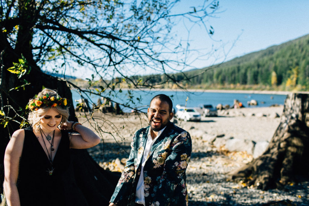 bride and groom laugh during wedding ceremony