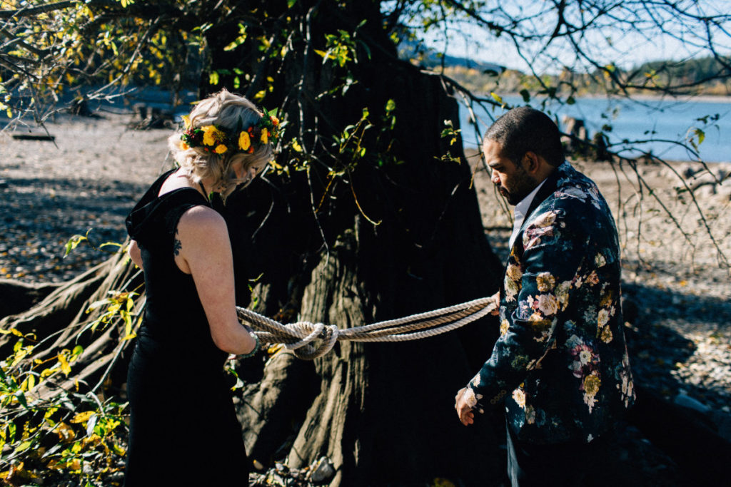 couple ties the knot with handfasting cords