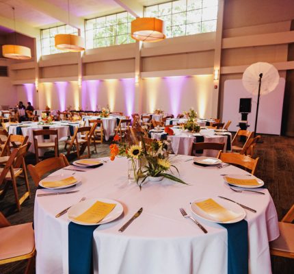 wedding reception layout with sunflower centerpieces
