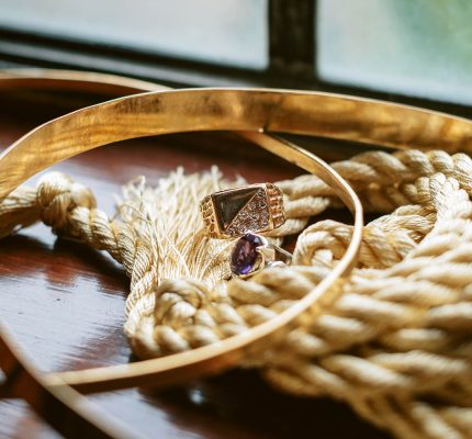 ropes and gold details with wedding rings