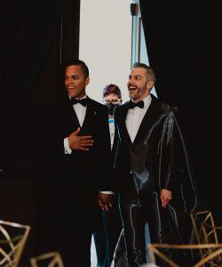 Andy and Victor standing together on their wedding day